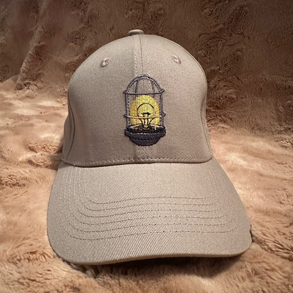 Tan Theater Cap with Embroidered Ghost Light Design